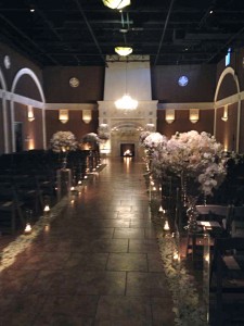 Casa Real's reception room magically transformed with lights and flowers. An Elegant Touch of Strings performed as a string trio